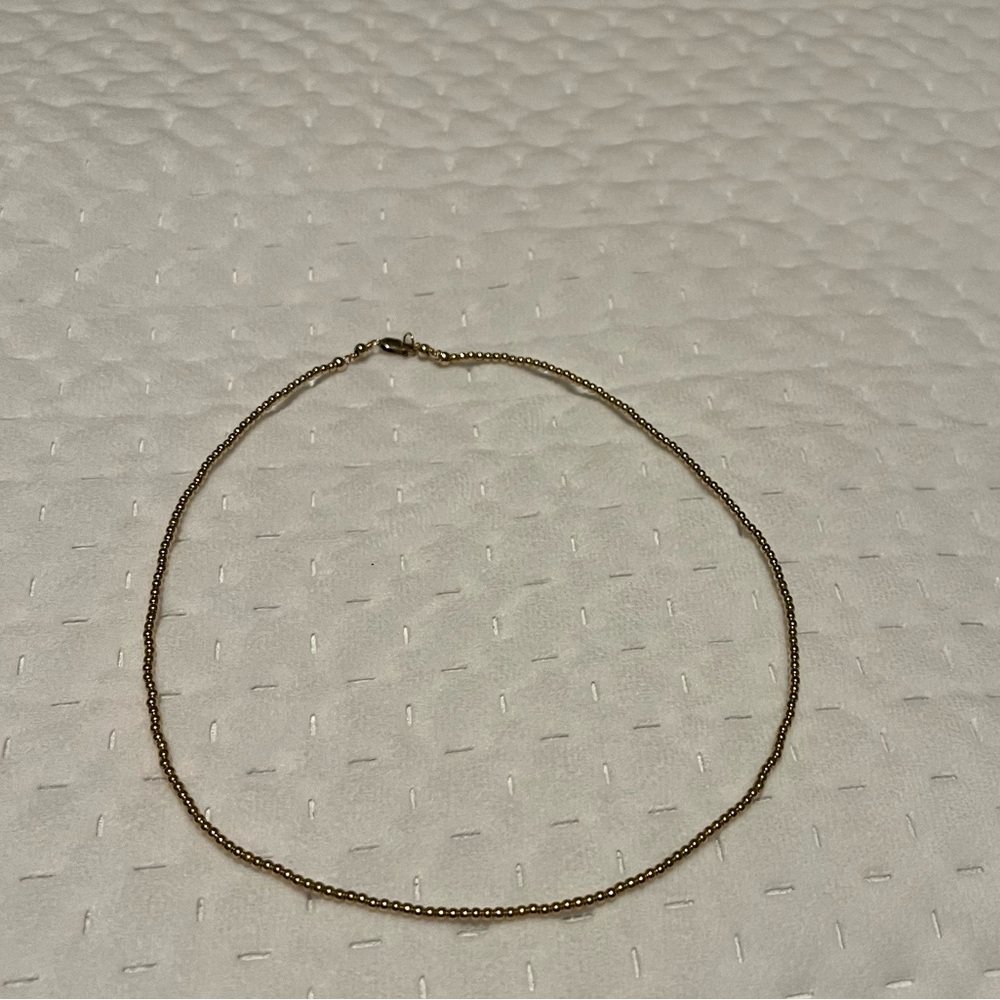 gold beaded enewton necklace!